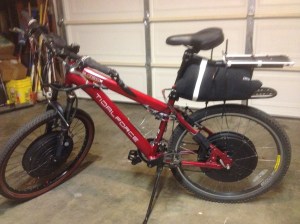 For a fun historical read try electricbike.com's "The Strange Saga of Tidalforce". I was told by someone involved with the project that it's "mostly" true. I can tell you this much: at 44V, this nearly 20lb motor will push you up to 28mph smoothly, silently and remain at near ambient temperature all day long. That front black hub is the stock battery that anyone owning one of these should quickly replace in favor of any common 36v-44v pack. 